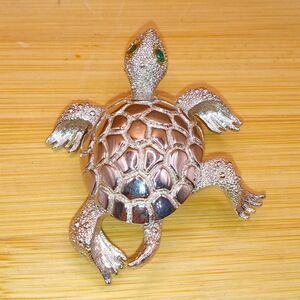 1960s Monet Silver Tone Sea Turtle Brooch with Emerald Green Rhinestone Eyes
